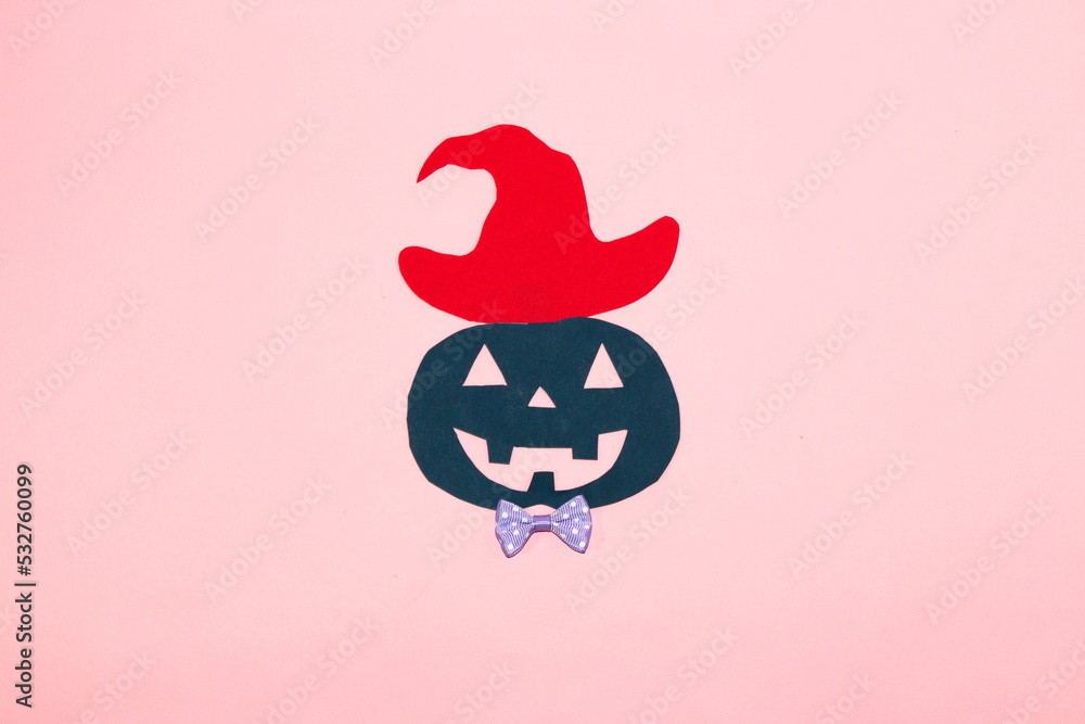 dark blue paper pumpkin with hat ready for party, creative art halloween concept, flat lay paper craft dark blue paper pumpkin with hat ready for party, creative art halloween concept, flat lay paper craft