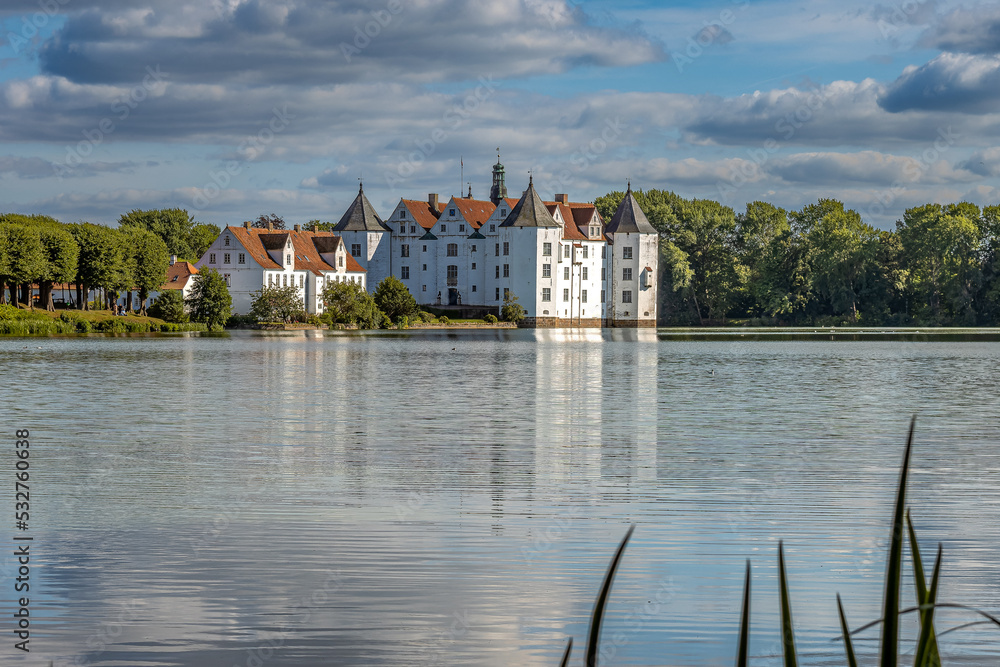 Gluecksburg Castle on the Flensburg Fjord photographed from the lake side. Gluecksburg Castle on the Flensburg Fjord photographed from the lake side.