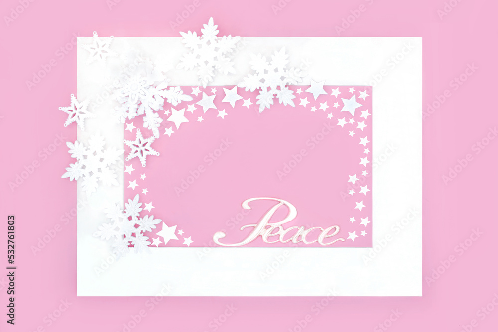 Christmas peace sign with snowflake and star decorations on pastel pink background with white frame. Minimal festive design for winter, Xmas and New Year holiday season.