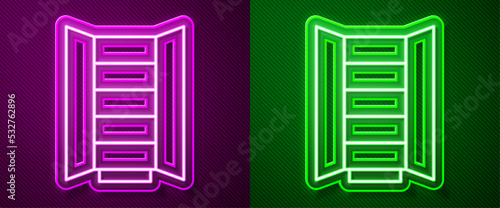 Glowing neon line Wardrobe icon isolated on purple and green background. Cupboard sign. Vector