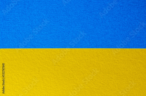 Abstract colored paper in Ukraine national flag colors texture background. Minimal geometric shapes and lines in blue  navy blue  yellow colors