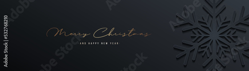 Elegant Merry Christmas and Happy New Year banner. Dark christmas paper cut snowflake with shadow on black background. Horizontal christmas template. Suit for poster, header, website, greeting card