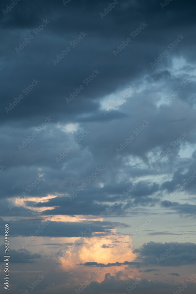 Real sunset sky with beautiful light clouds. Huge permissions.