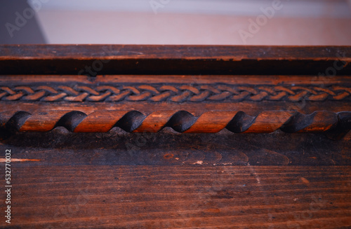 Wooden handle of vintage casket background