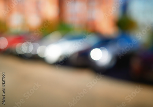 Car parking out of focus bokeh backdrop © spacedrone808