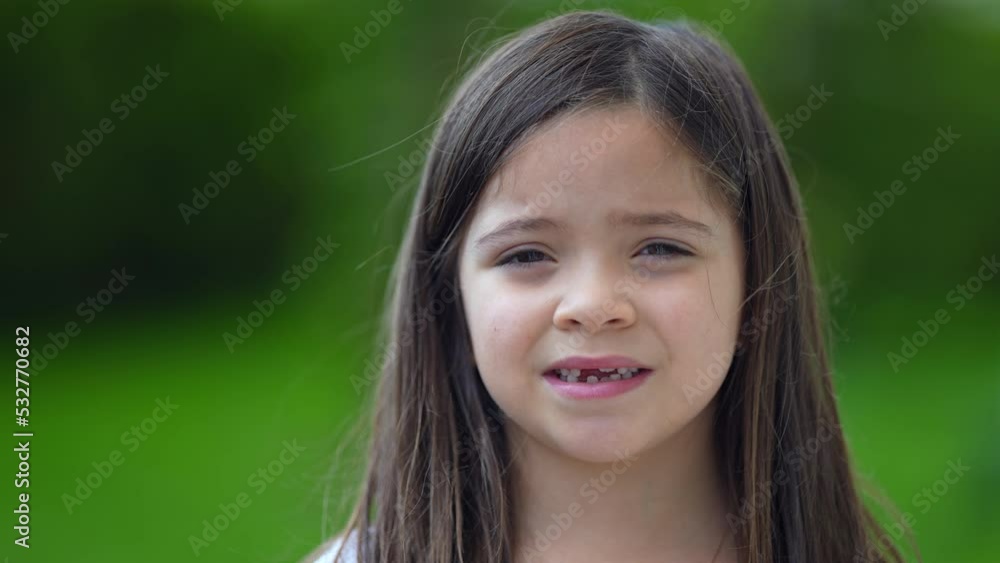 Portrait child with missing teeths smiling at camera Portrait child with missing teeths smiling at camera