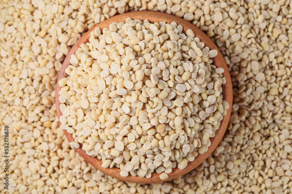 White Lentils (Urad Dal). White Lentils in Pottery White Lentils (Urad Dal). White Lentils in Pottery