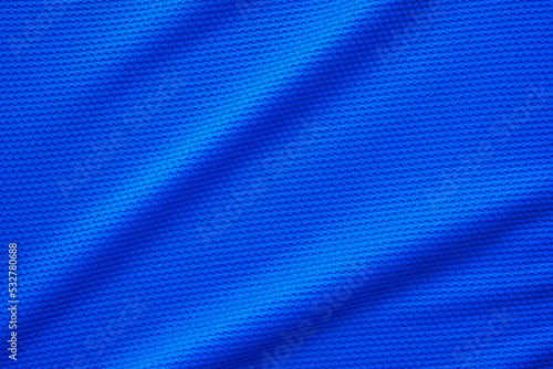 Blue football jersey clothing fabric texture sports wear background, close up top view