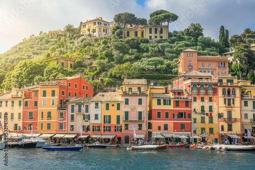 Above Portofino with houses, luxury boats and yacht, bay harbor. Liguria, Italy