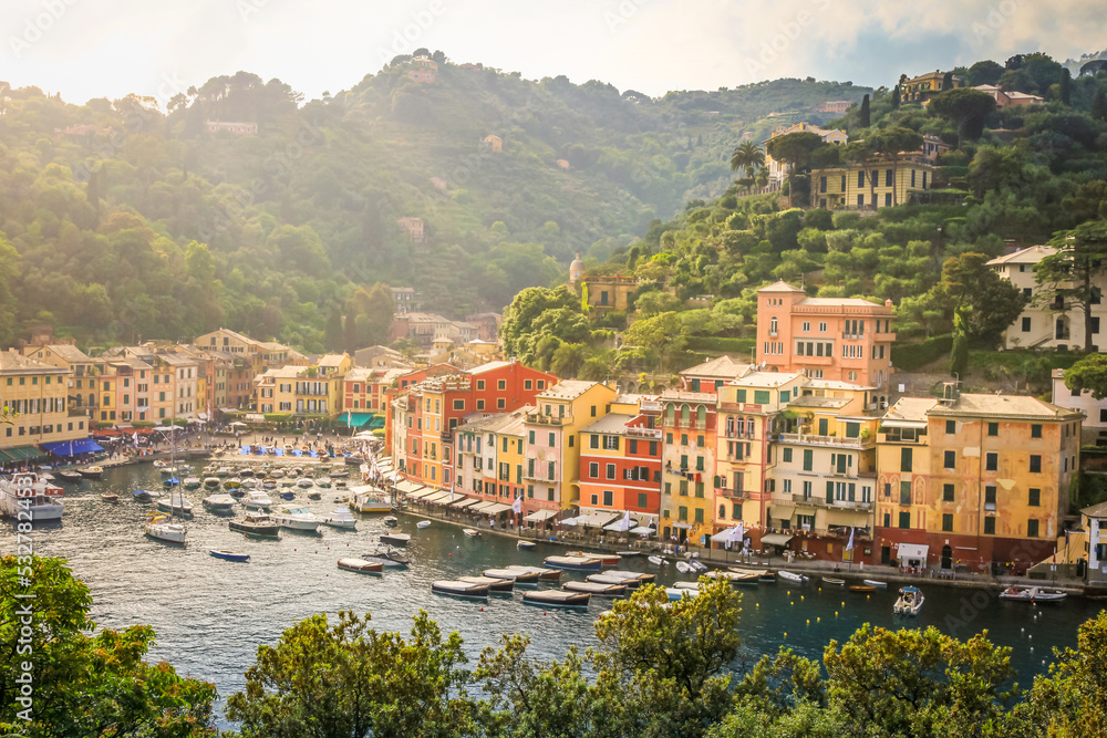Above Portofino with houses, luxury boats and yacht, bay harbor. Liguria, Italy