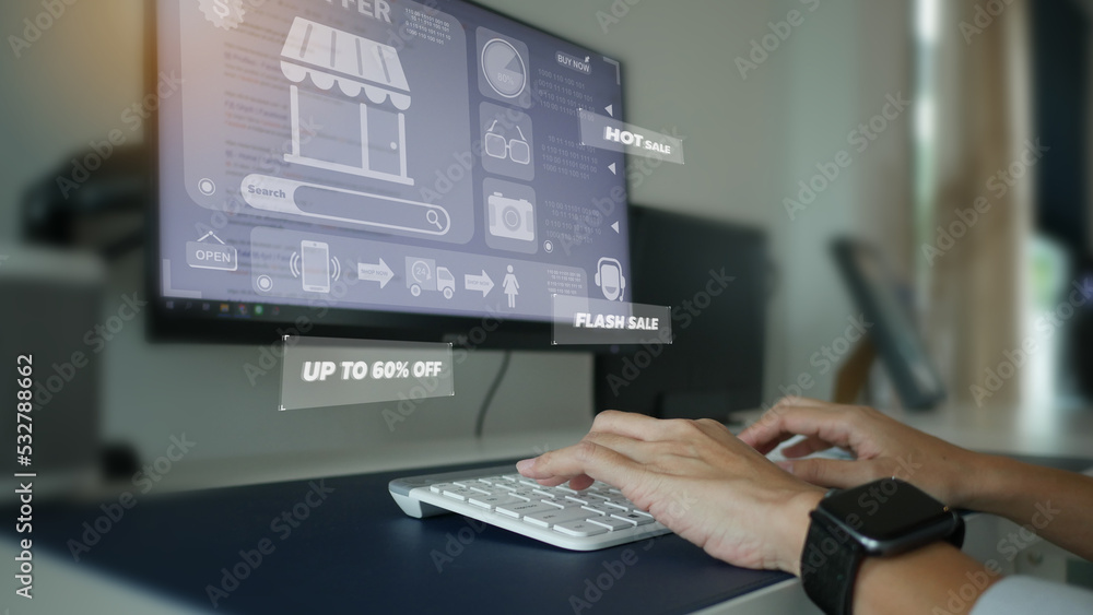 Young woman shopping online by looking through a 3D hologram screen, Young woman shopping online by looking through a 3D hologram screen,