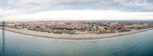 Aerial drone panorama view of Valencia, Spain beaches at sunrise photo