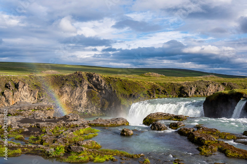 Sunset Rainbow at godafoss waterfall in Iceland