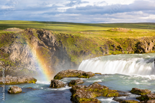 Sunset Rainbow at godafoss waterfall in Iceland