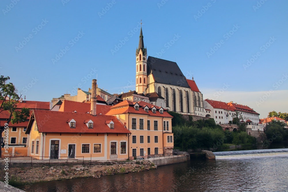 A view to the historical town with church in the middle at Cesky Krumlov, Czech republic A view to the historical town with church in the middle at Cesky Krumlov, Czech republic