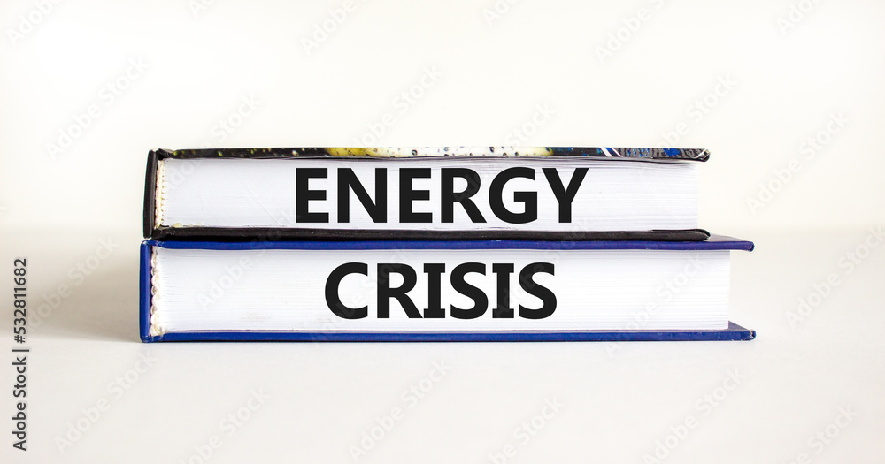 Global energy crisis symbol. Concept words Energy crisis on books. Beautiful white table white background. Business global energy crisis concept. Copy space.