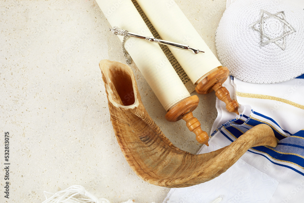 Yom kippur concept. Tallit, Thorah and Shofar jewish religious symbols