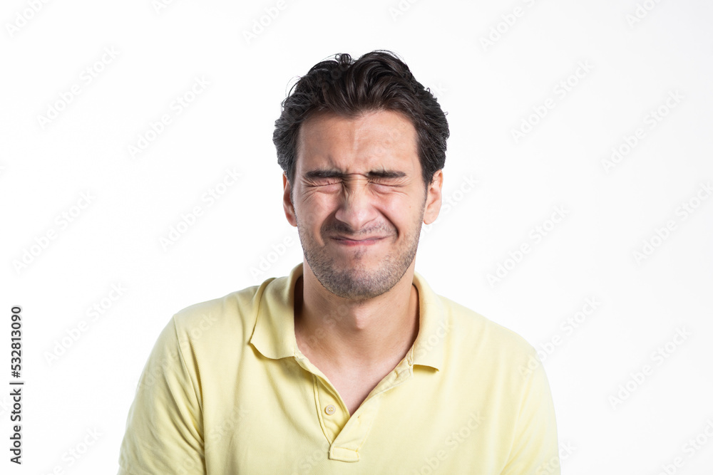 Close up portrait of unhappy stressed man isolated on white background Close up portrait of unhappy stressed man isolated on white background