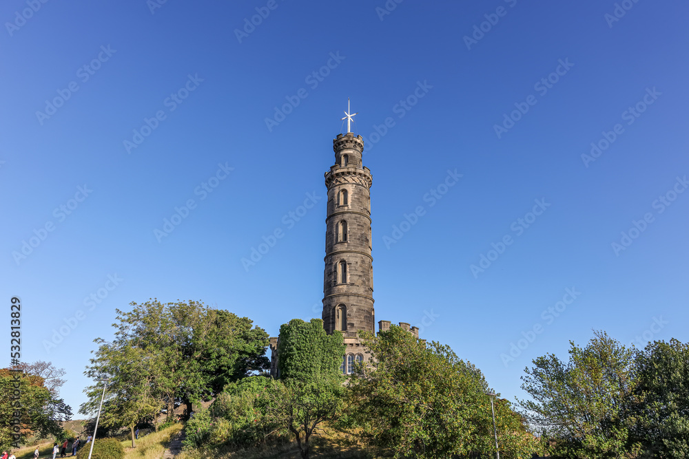 Bottom-up view of Nelson Monument on Calton Hill in Edinburgh, Scotland. It is built in honor of Admiral Horatio Nelson.