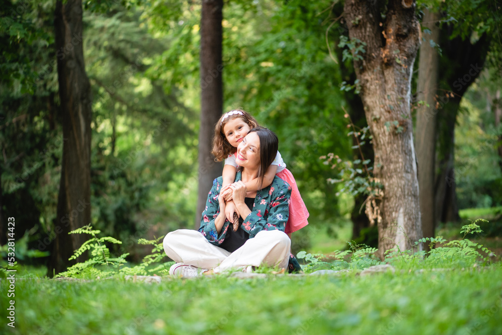 mother and daughter hugging each other happily and smiling mother and daughter hugging each other happily and smiling