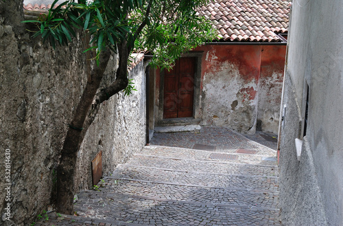 Fototapeta Naklejka Na Ścianę i Meble -  Old Stepped Stone Cobbled Street in Italian Village 