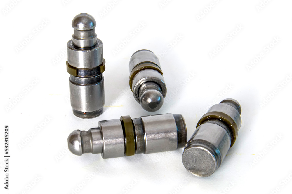 Tappet. Car spare parts isolated on white. Tappet. Car spare parts isolated on white.