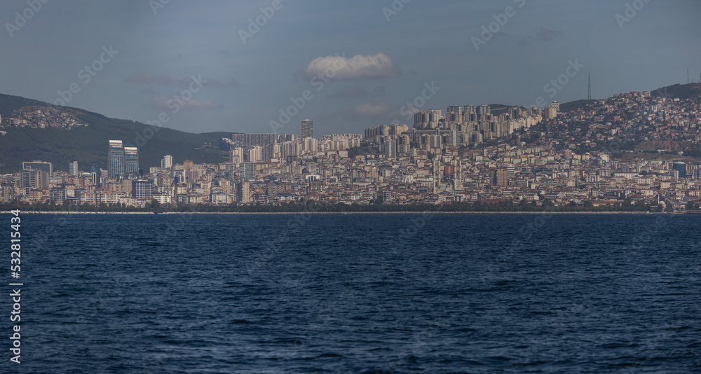 Fototapeta premium silhouette Istanbul city buildings from water Bosphorus or Golden Horn, public places.