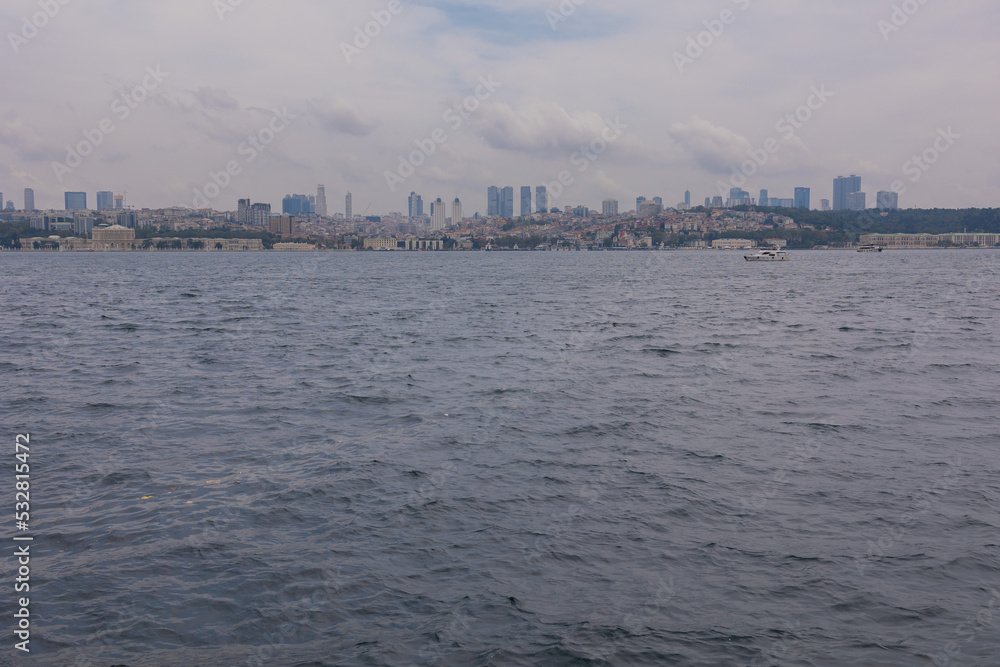 silhouette Istanbul city buildings from water Bosphorus or Golden Horn, public places.