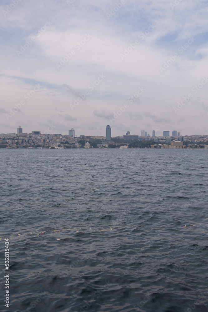 silhouette Istanbul city buildings from water Bosphorus or Golden Horn, public places.