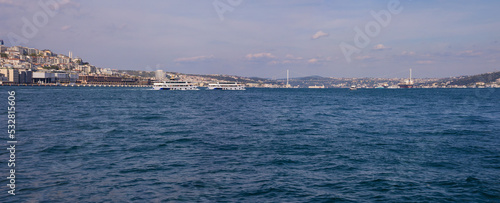 silhouette Istanbul city buildings from water Bosphorus or Golden Horn, public places. © Kozlik_mozlik