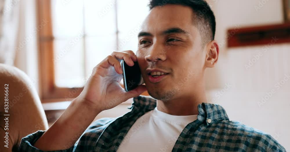 Home, sofa and phone call with a man talking, online networking or relax communication in his living room. Young guy answer cellphone for a happy discussion or conversation while on the couch