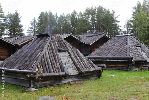 Obraz na płótnie View of buildings in the Arvidsjaur Sami village with overnight wodden church cootages and gåhties. w salonie