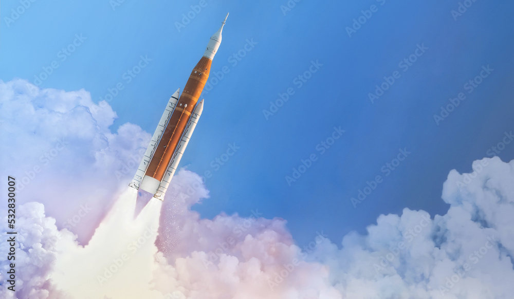 Space launch system flight in space from Earth. SLS rocket in sky. Mission on Moon of Orion spacecraft. Spaceship take off. Artemis space program. Elements of this image furnished by NASA
