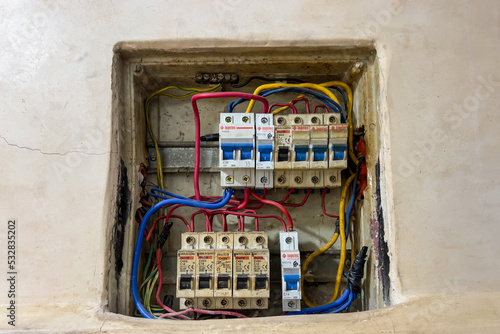 Close up of electrical panel with wiring and miniature circuit breaker