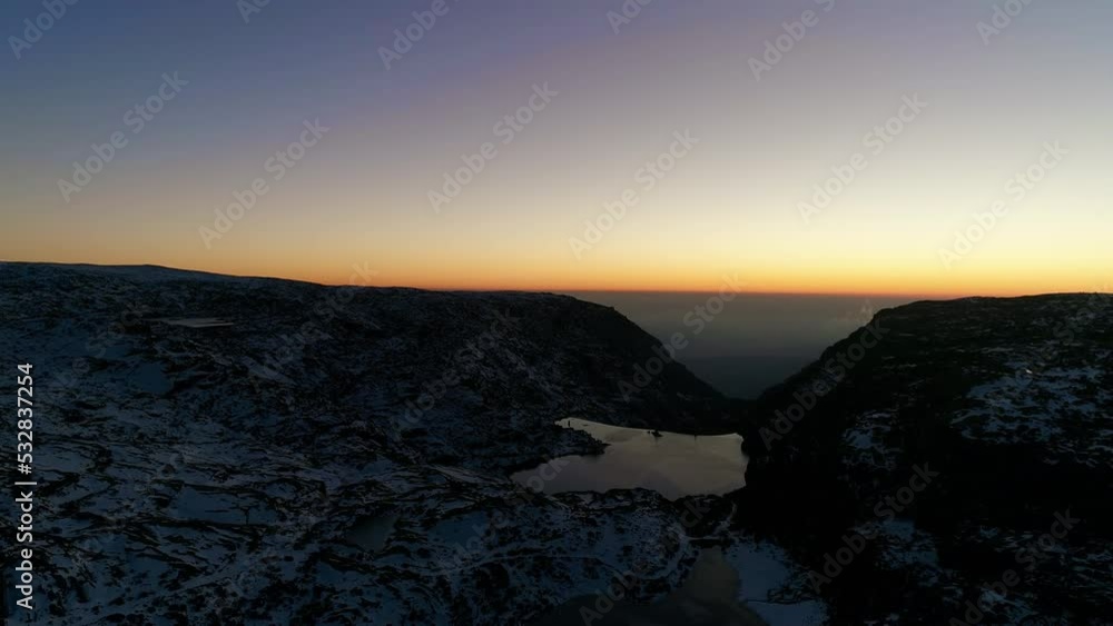 Drone Flight Over a Frozen Lake in the Evening Drone Flight Over a Frozen Lake in the Evening
