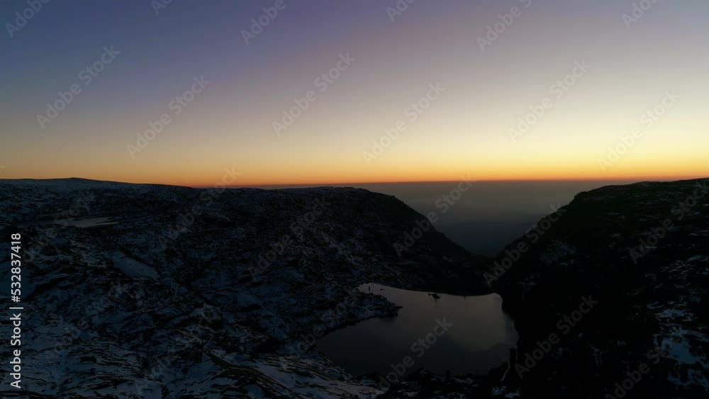 Drone Flight Over a Frozen Lake in the Evening Drone Flight Over a Frozen Lake in the Evening