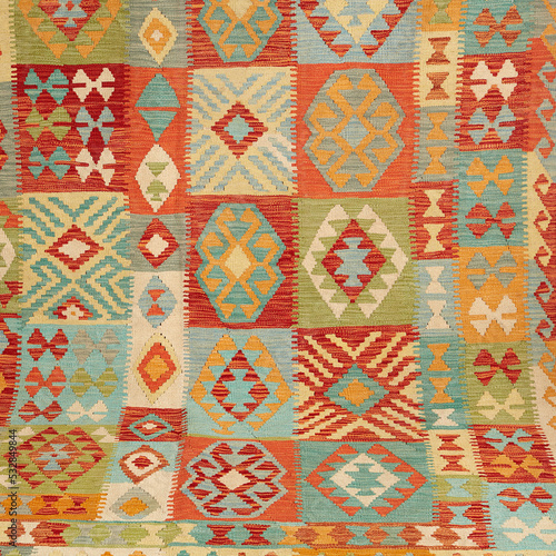 Detail product photograph of a beautifully colorful handmade afghan rug