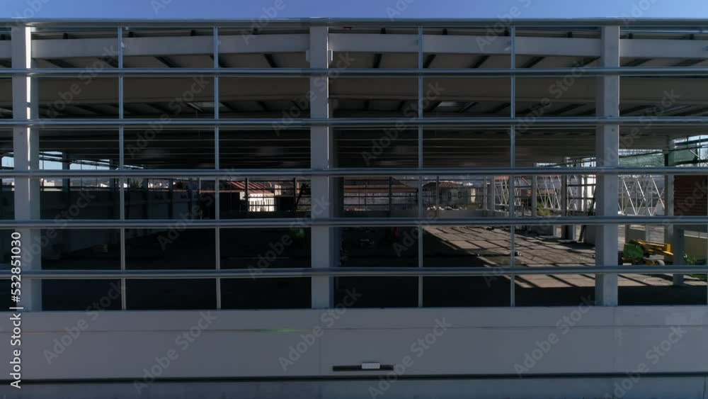 New Building Construction. Facade Architecture of Industrial Pavillion New Building Construction. Facade Architecture of Industrial Pavillion