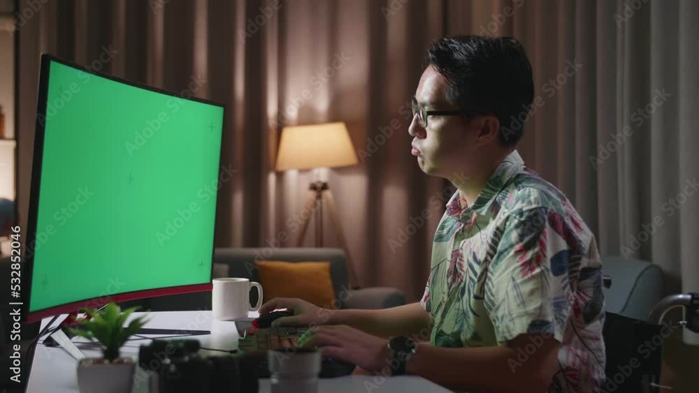 Side View Of Asian Man In Wheelchair Stretching While Using Mock Up Green Screen Desktop Next To The Camera At Home
Side View Of Asian Man In Wheelchair Stretching While Using Mock Up Green Screen Desktop Next To The Camera At Home