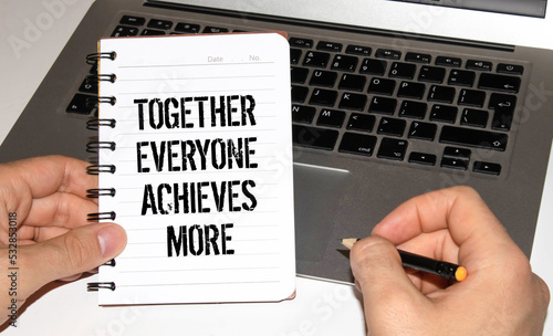 Canvas Print Together everyone achieves more phrase written with a typewriter.