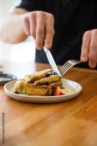 person holding a plate of food