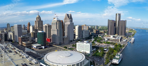 Panoramic view of high rise buildings such as Renaissance center and financial district in Detroit downtown.