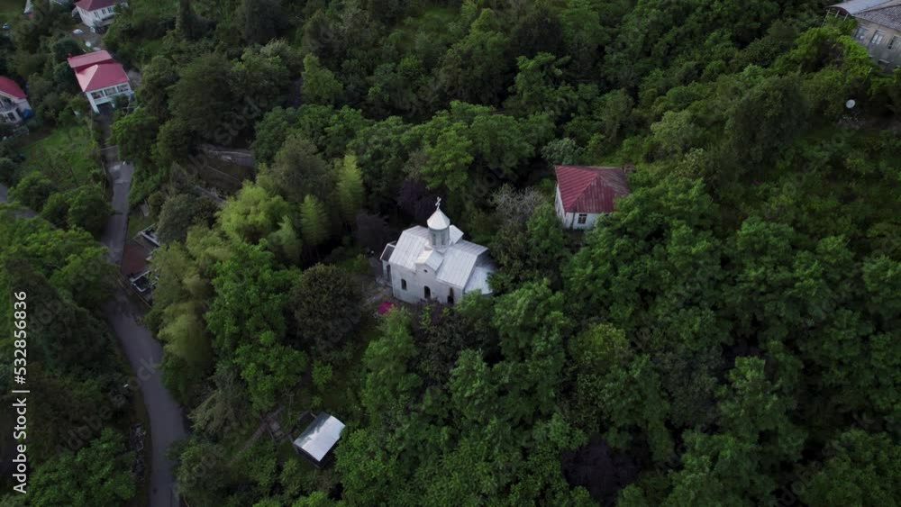 Aerial rotary view on monastery located in mountain . High quality 4k footage