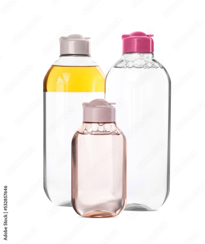 Bottles of micellar cleansing water on white background Bottles of micellar cleansing water on white background
