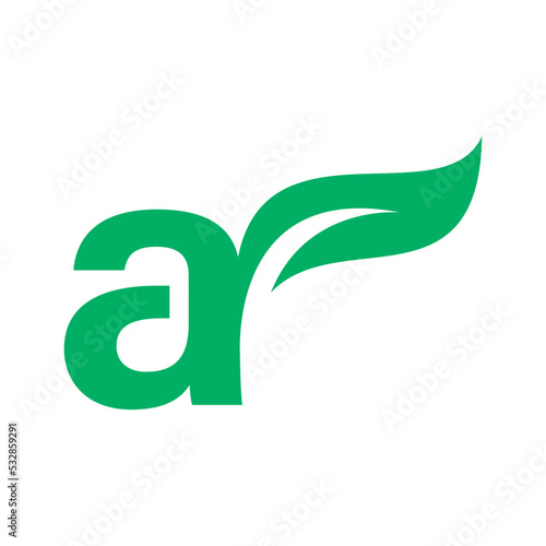 Initial letter with green leaf logo