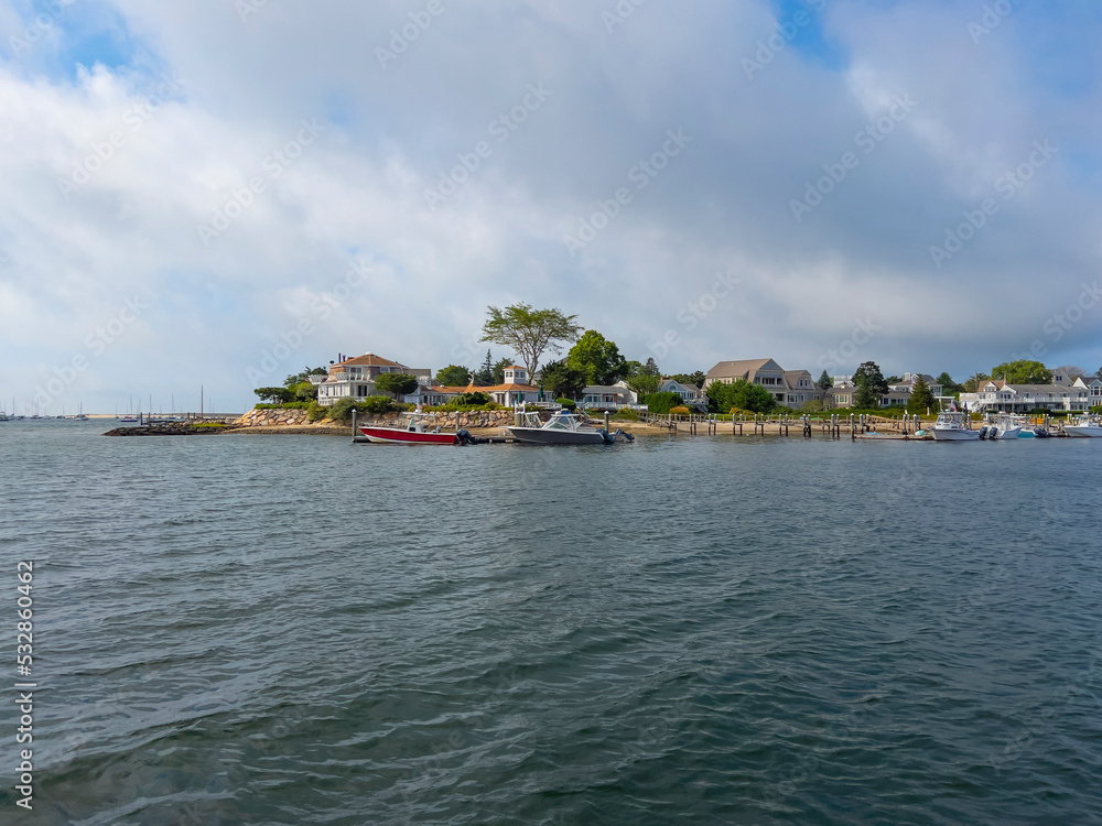 Historic waterfront houses at Lewis Bay in village of Hyannis, town of Barnstable, Cape Cod, Massachusetts MA, USA. 
