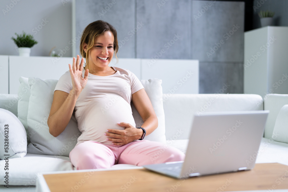 Pregnant Woman Using Online Video Call With Doctor Pregnant Woman Using Online Video Call With Doctor