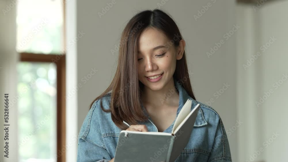 Young cute asian woman freelancer working at cafe. Young cute asian woman freelancer working at cafe.