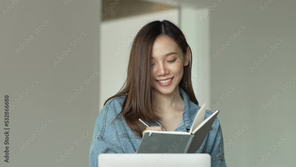 Young cute asian woman freelancer working at cafe. Young cute asian woman freelancer working at cafe.