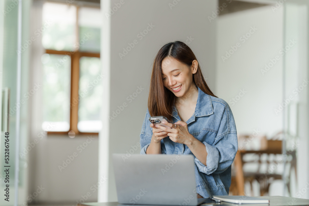 Young happy pretty asian woman using mobile smartphone for shopping online, cashless society concept. Young happy pretty asian woman using mobile smartphone for shopping online, cashless society concept.
